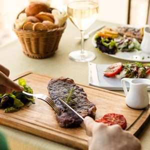 brown wicker basket with foods on table