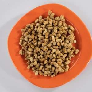 brown peanuts on red ceramic plate