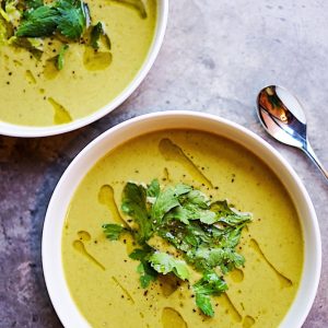 green soup on white ceramic bowl