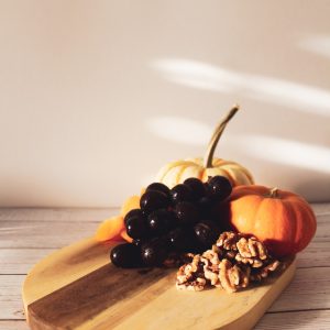 a fruit on a cutting board