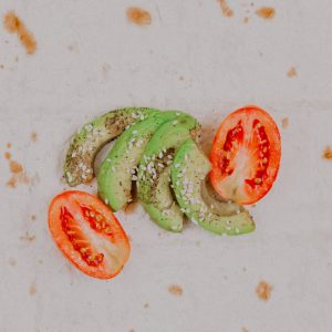 sliced cucumber and tomato on white ceramic plate