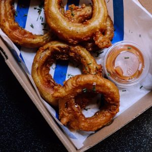 onion rings on white paper