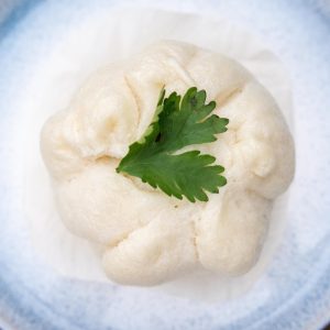 green leaf on white ceramic plate