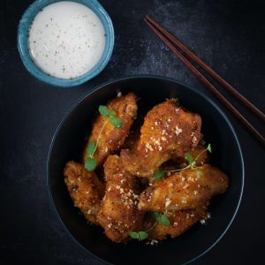 fried chicken on black frying pan