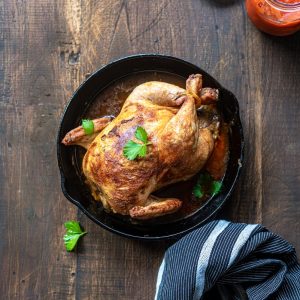 chicken on black round plate