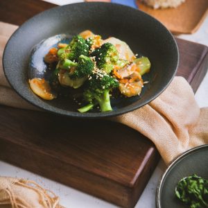 vegetable salad served on black ceramic plate