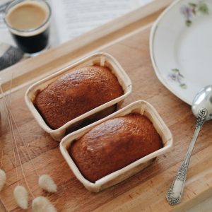 brown meat on white ceramic tray