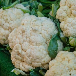 a close up of cauliflower on display for sale