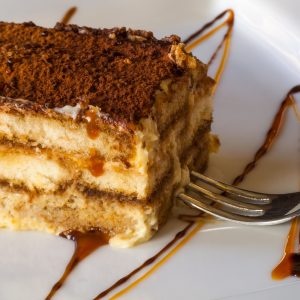 sliced cake on white plate