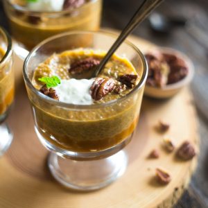 selective focus photography of clear sorbet glass filled with dessert