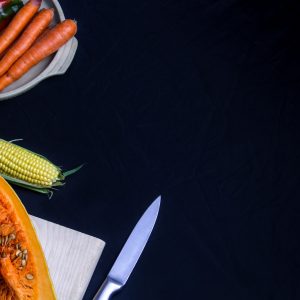 sliced squash near corn and carrots