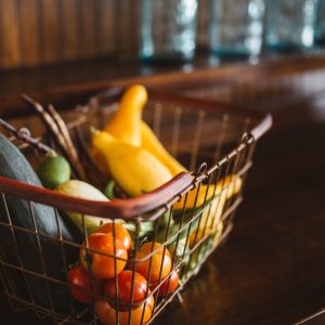 selective focus photography of vegetables in basket