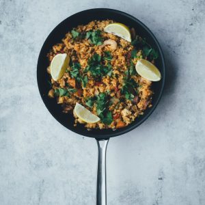 black frying pan with food on top