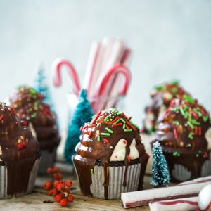 cupcakes with sprinkles on table