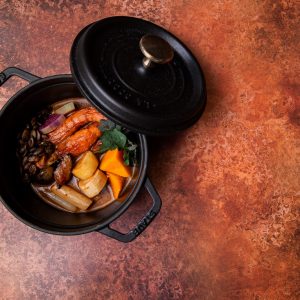 black cooking pan with food