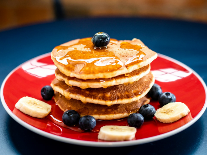 baked pancake with blueberry and slice of banan