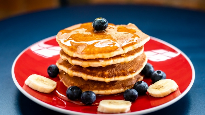 baked pancake with blueberry and slice of banan